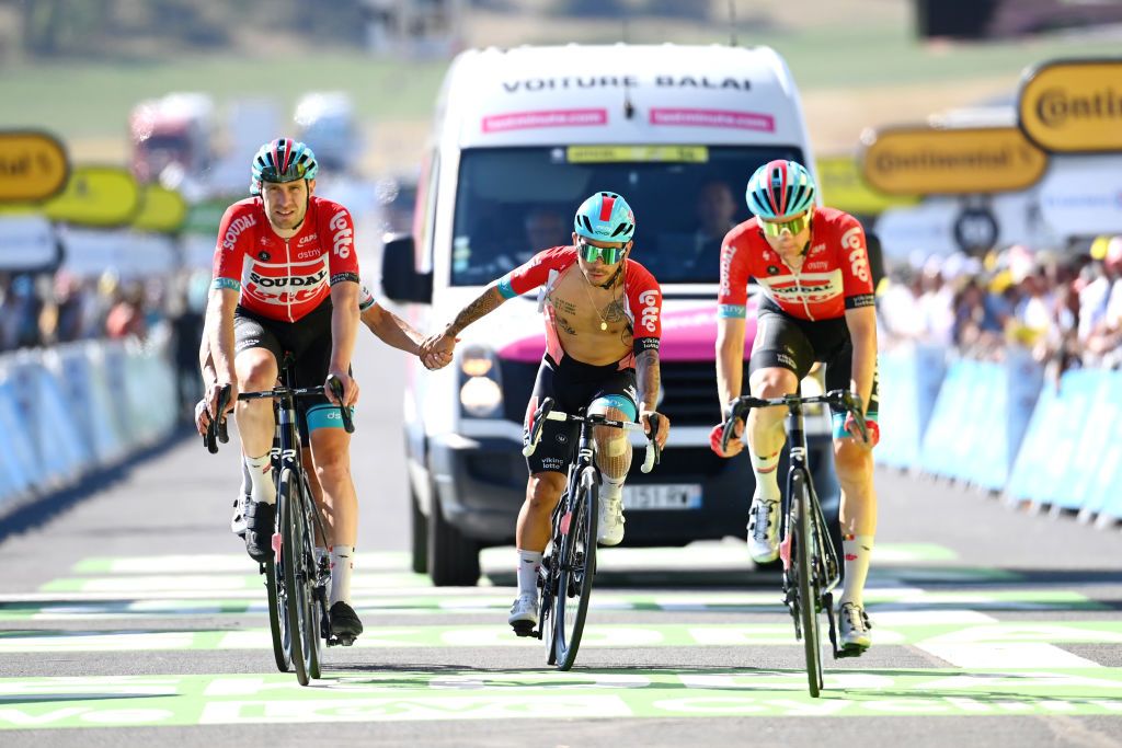 Caleb Ewan finishes the Tour de France stage with his Lotto Soudal teammates just in front of the broom wagon