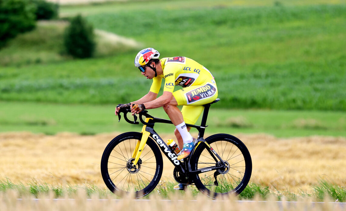 Wout van Aert loses yellow jersey but goes down swinging