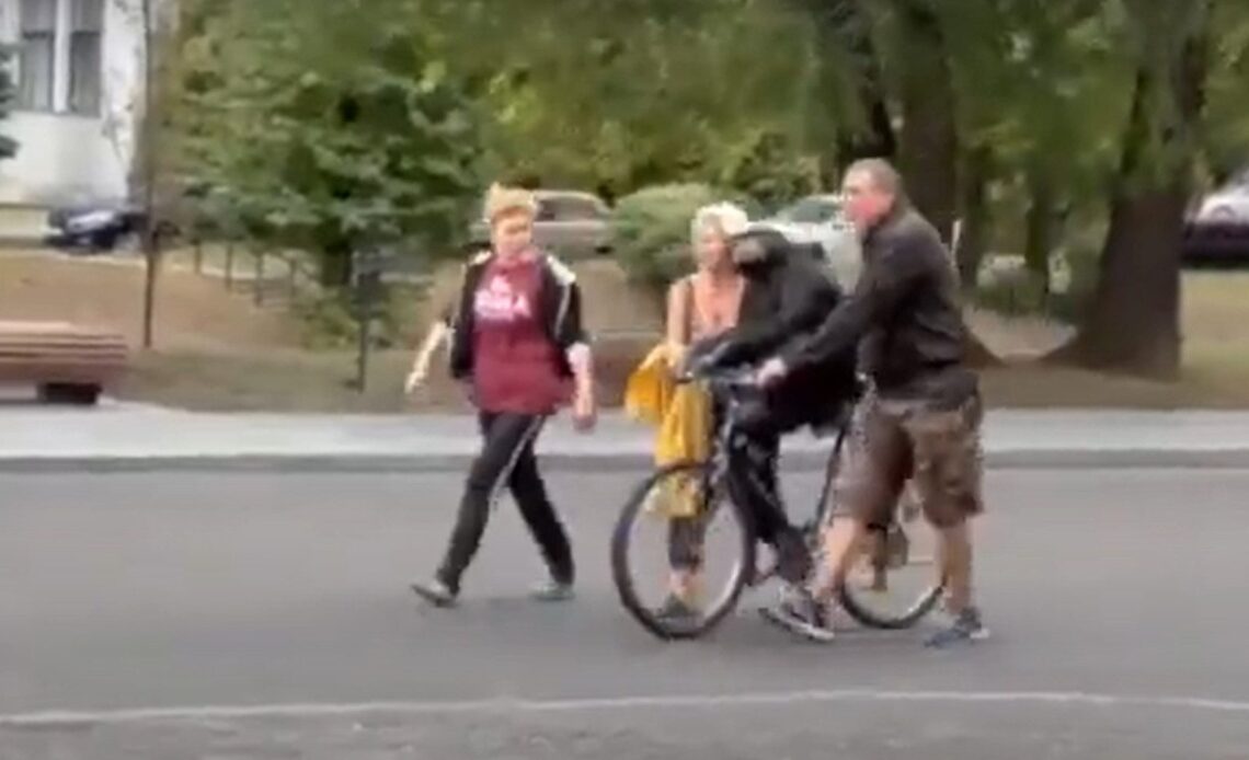 Escaped chimp returns to Ukrainian zoo only when he’s allowed to ride his keeper’s bicycle