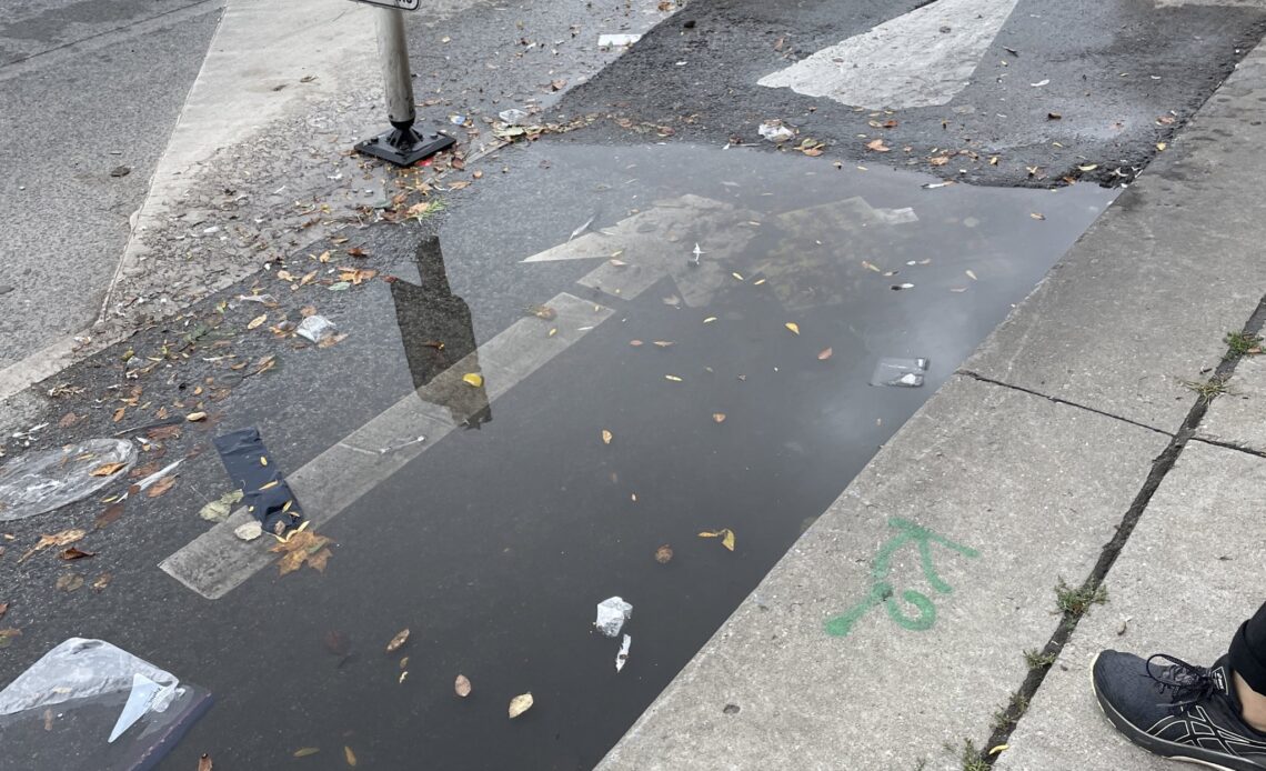 Toronto cyclists are fed up with a frozen ‘pond’ on a bike path