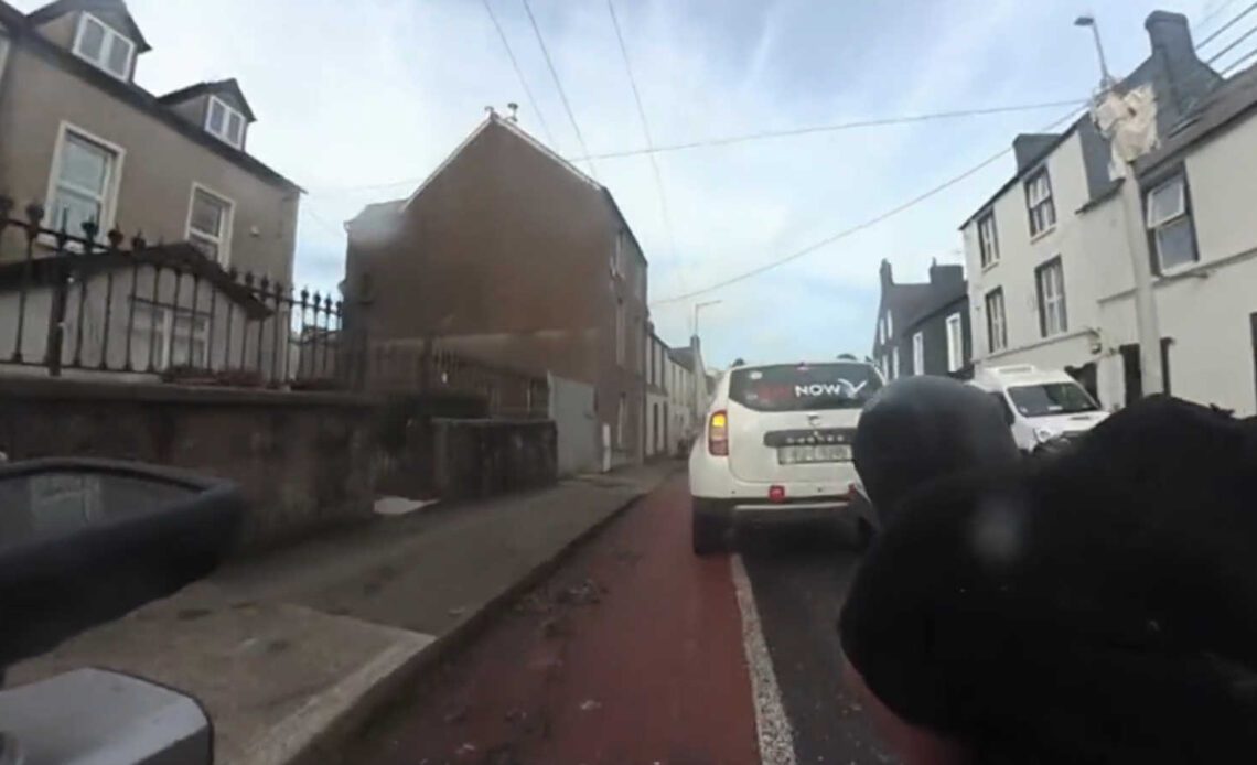 cab and cyclist in Cork Ireland