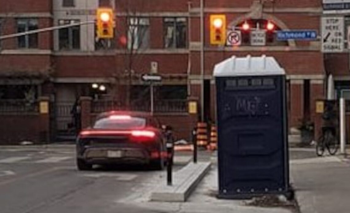 There’s a Porta Potty in a Toronto bike lane and it’s gotta be a metaphor for something