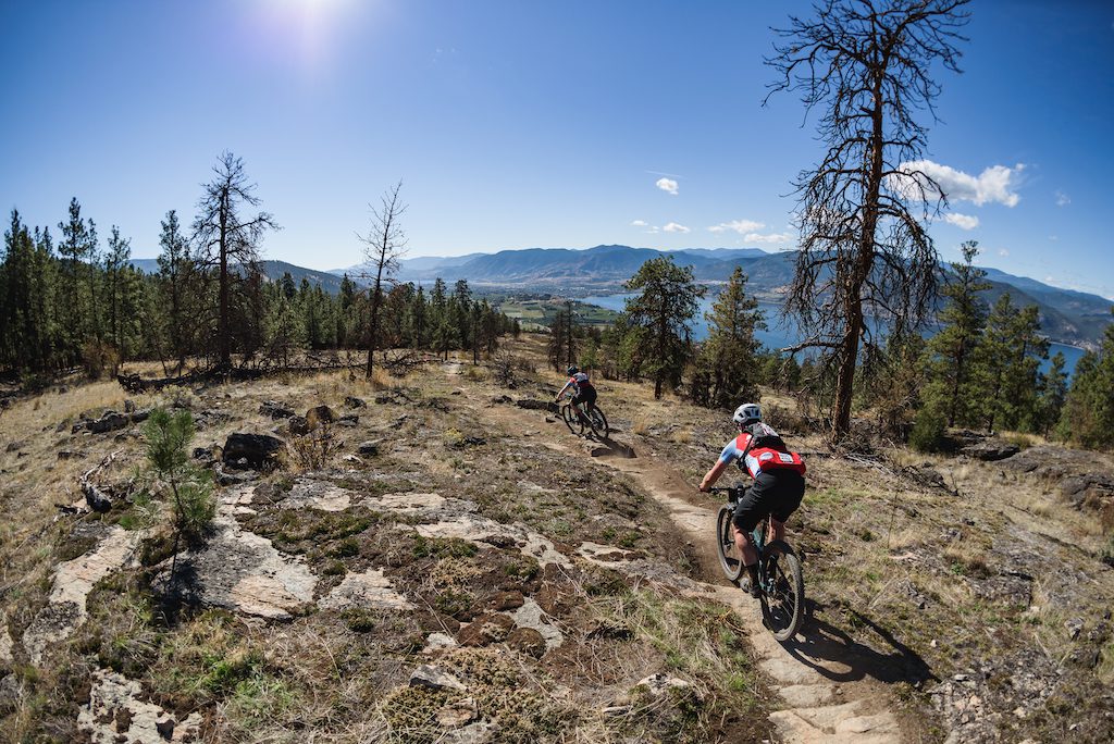 Two riders descend a rocky trail in Naramata's Three Blind Mice network during BC Bike Race