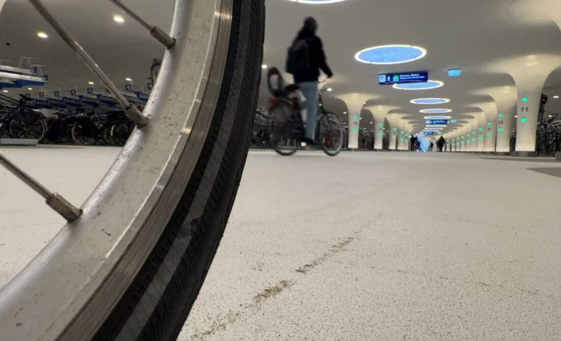 Riding into the massive Amsterdam underwater cycling garage is incredible