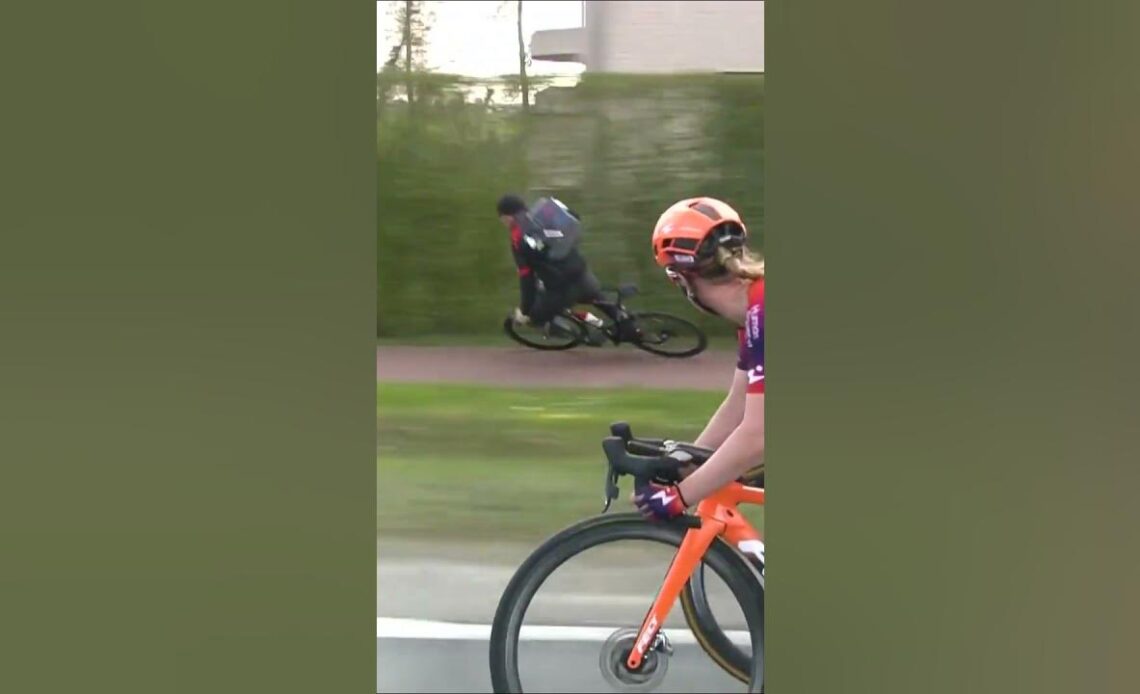 Spectator Crashes While Riding Alongside Peloton! #shorts