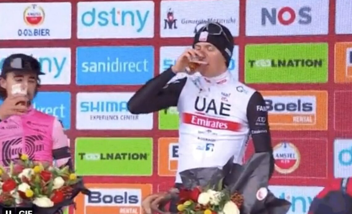 Tadej Pogačar downed his Amstel Gold beer like a champ