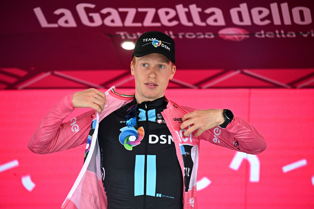 FOSSOMBRONE ITALY MAY 13 Andreas Leknessund of Norway and Team DSM celebrates at podium as Pink Leader Jersey winner during the 106th Giro dItalia 2023 Stage 8 a 207km stage from Terni to Fossombrone UCIWT on May 13 2023 in Fossombrone Italy Photo by Stuart FranklinGetty Images