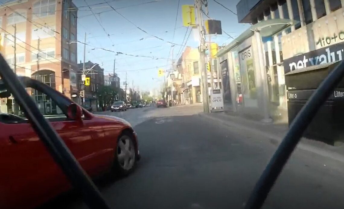 A cyclist is threatened by a motorist in Toronto