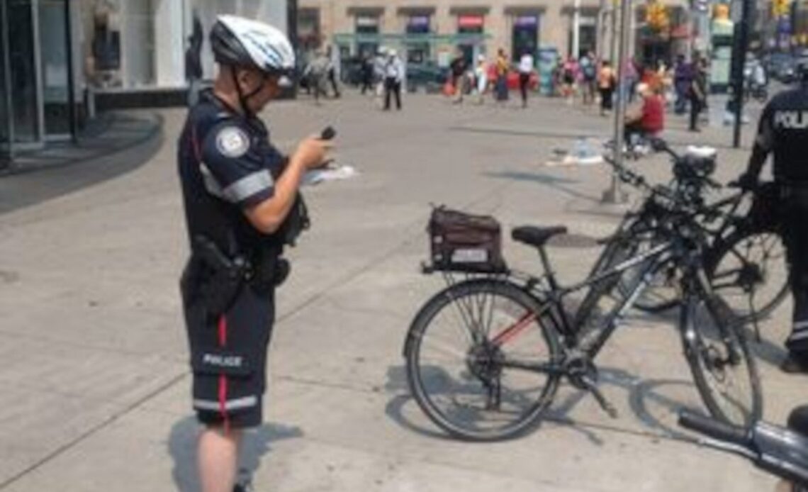 Toronto Police fine cyclists $325 for riding through pedestrian walk signal