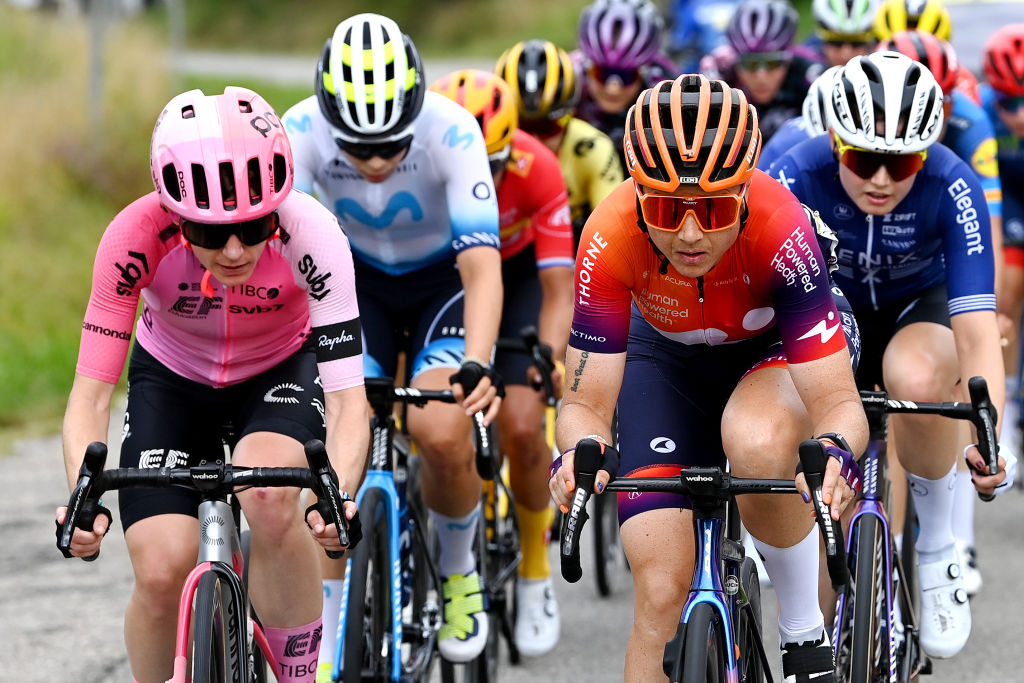 Tour de France Femmes riders defend motorbike after contact and close pass on stage 4