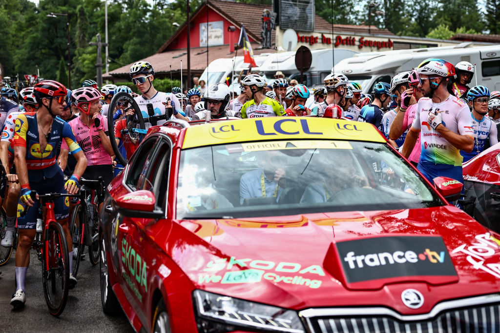 Tour de France stage 14 neutralised after early mass crash