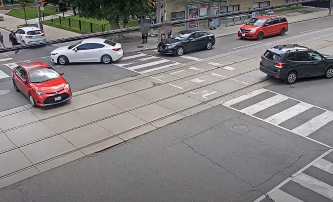Stolen car hits bike police in Toronto