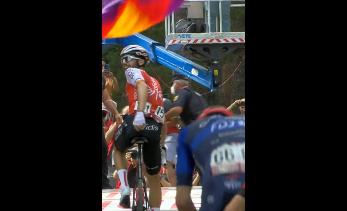 The finish where Jesus Herrada's Cofidis soigneur is tackled