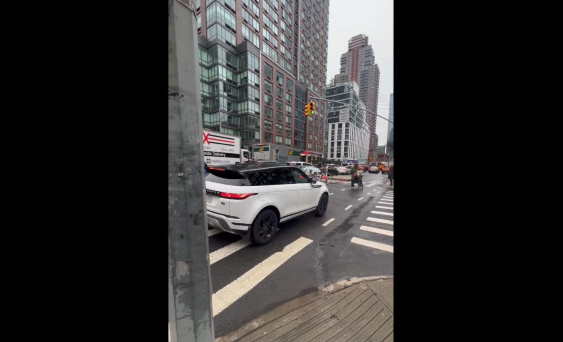 An legend of a human stopped NYC drivers from sneaking into the bike lane