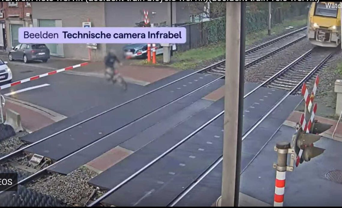 Belgian cyclist skirts death by train