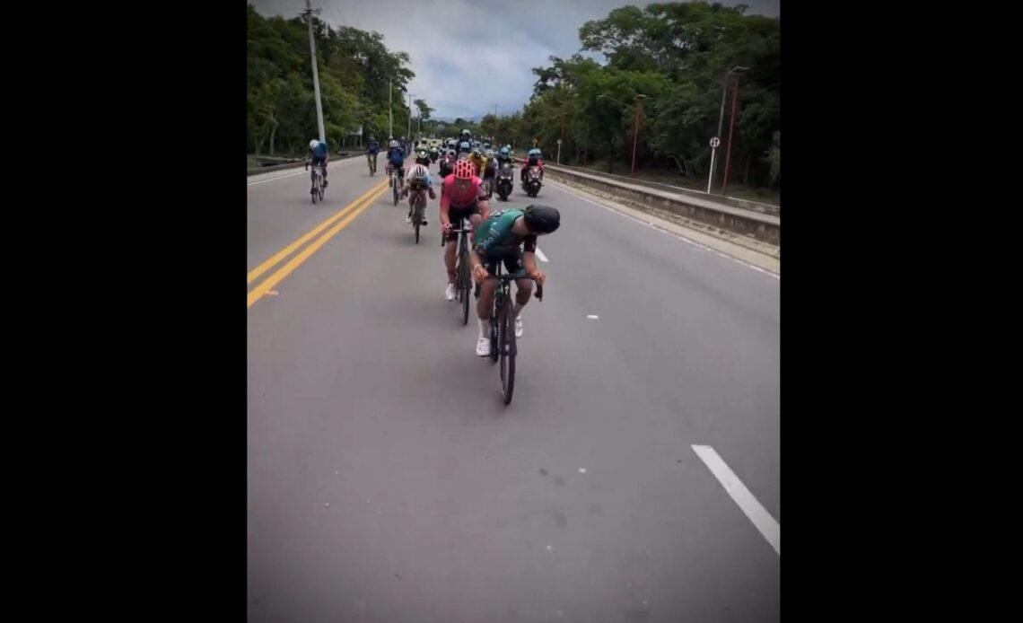Pros ride by amatuers in Colombia