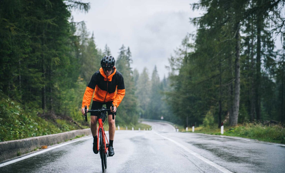 How can I stay safe riding in the rain?