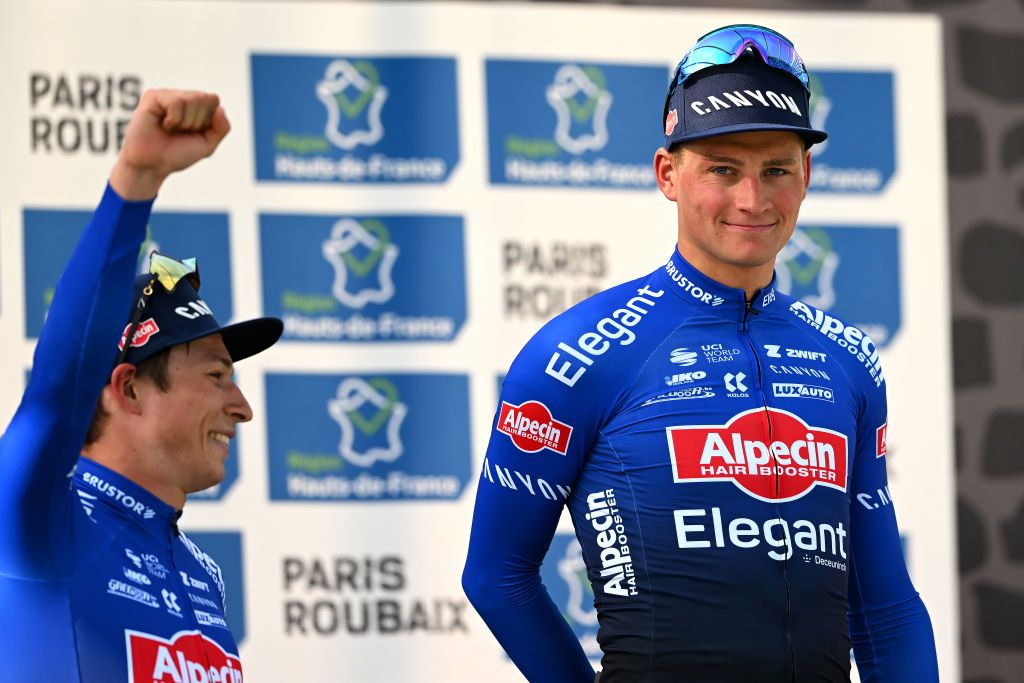 ROUBAIX FRANCE APRIL 09 LR Jasper Philipsen of Belgium and Team AlpecinDeceuninck on second place and race winner Mathieu van der Poel of The Netherlands and Team AlpecinDeceuninck pose on the podium ceremony after the 120th ParisRoubaix 2023 Mens Elite a 2566km one day race from Compigne to Roubaix on UCIWT April 09 2023 in Roubaix France Photo by Luc ClaessenGetty Images