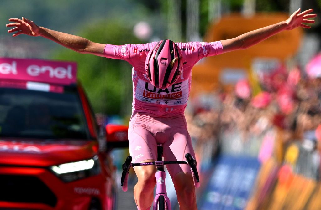 Tadej Pogačar (UAE Team Emirates) celebrates at finish line as stage winner during stage 20 at the Giro d