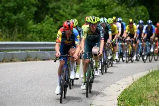 Mads Pedersen leading the peloton to the final climb of the 2024 Criterium du Dauphine