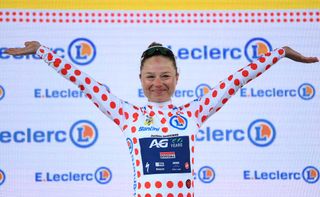 ALPE DHUEZ FRANCE AUGUST 18 Justine Ghekiere of Belgium and AG Insurance Soudal Team celebrates at podium as final Polka dot Mountain winner during the 3rd Tour de France Femmes 2024 Stage 8 a 1499km stage from Le GrandBornand to Alpe dHuez 1828m UCIWWT on August 18 2024 in Alpe dHuez France Photo by Alex BroadwayGetty Images