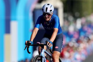 PARIS FRANCE AUGUST 04 Elisa Longo Borghini of Team Italy crosses the finish line during the Womens Road Race on day nine of the Olympic Games Paris 2024 at Trocadero on August 04 2024 in Paris France Photo by Tim de WaeleGetty Images