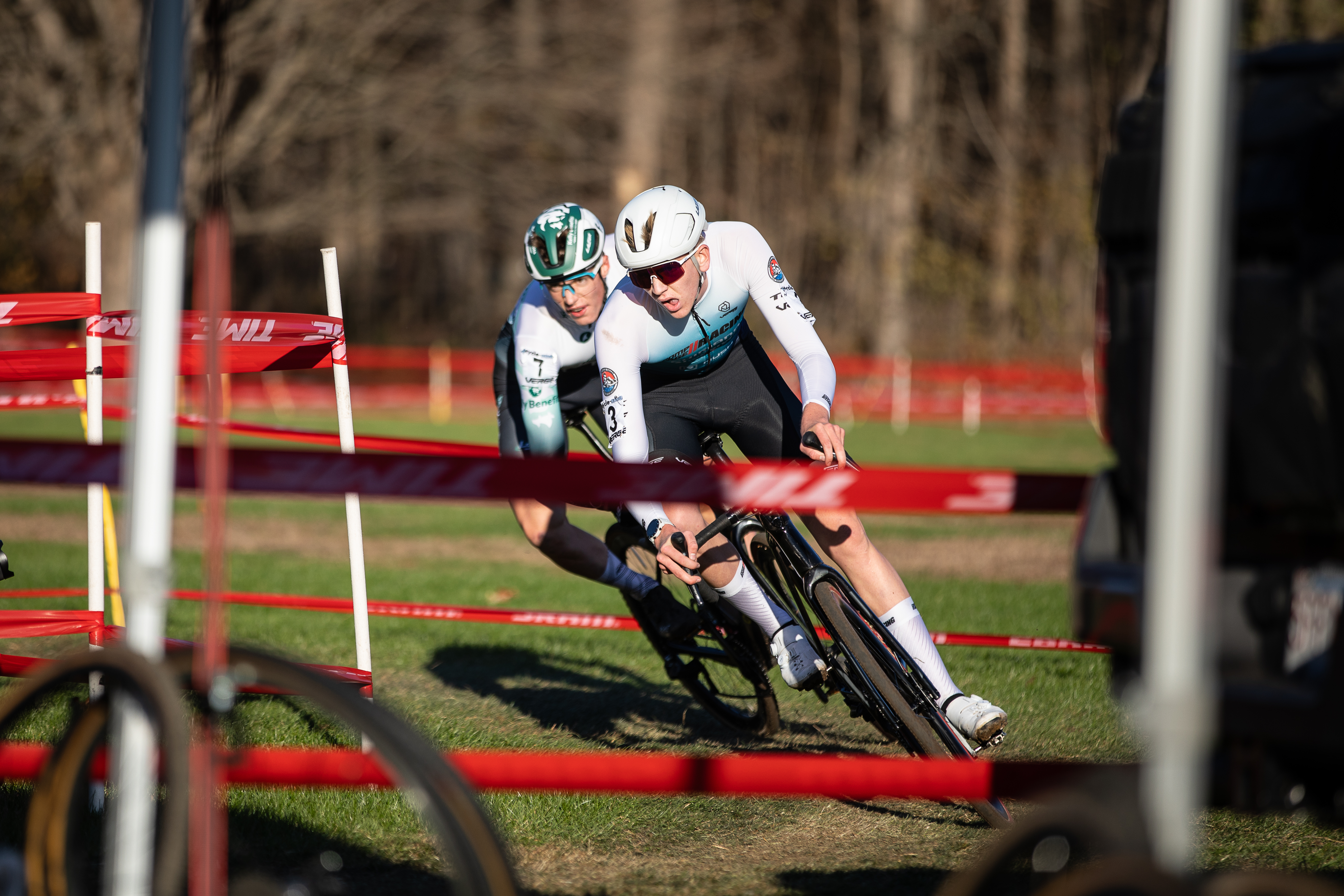 Ryan Drummond (Competitive Edge Racing) leads eventual Sunday winner Henry Coote (Trinity Racing) in elite men's race