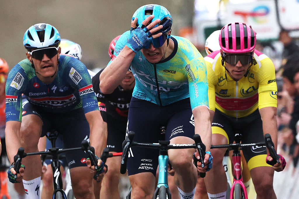 XDS Astana Team's German rider Max Kanter (C) celebrates as he crosses the finish line to win the 2nd stage of the Paris-Nice cycling race, 187 km between &Eacute;p&ocirc;ne and Montargis, on March 9, 2026. (Photo by Anne-Christine POUJOULAT / AFP)