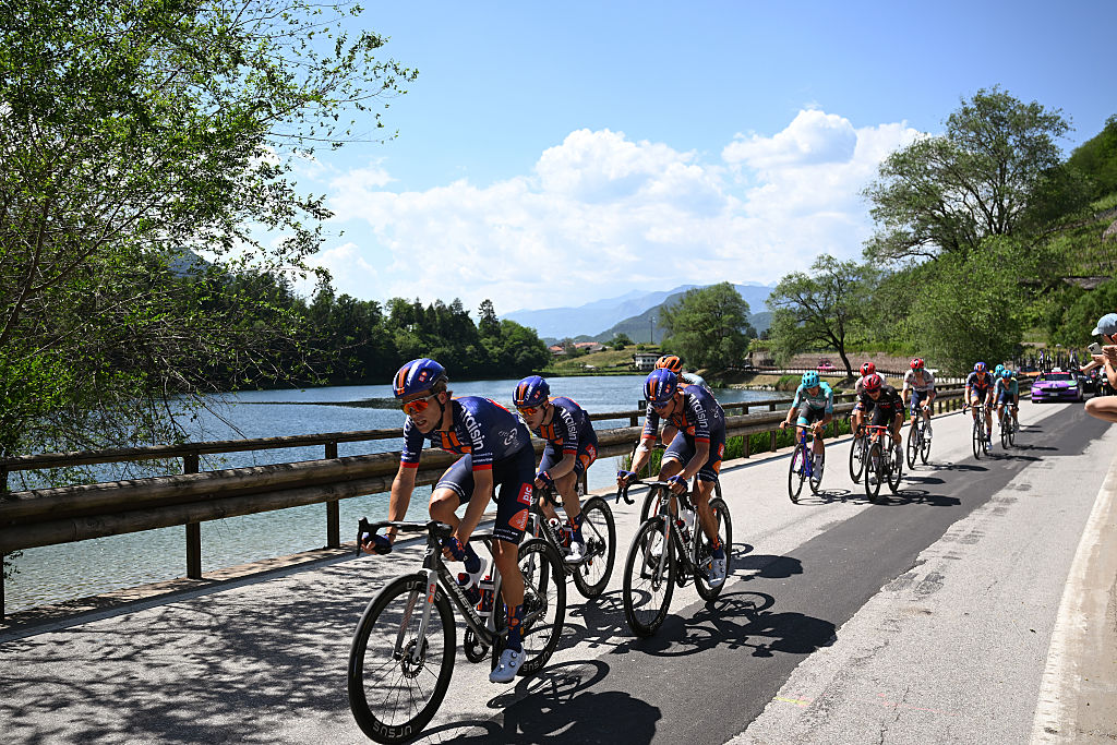 PIEVE DI SOLIGO, ITALY - MAY 28: (L-R) Tim Naberman of Netherlands, Warren Barguil of France and Team Picnic PostNL and a general view of the peloton competing during the 109th Giro d'Italia 2026, Stage 18 a 171km stage from Fai della Paganella to Pieve di Soligo / #UCIWT / on May 28, 2026 in Pieve di Soligo, Italy. (Photo by Tim de Waele/Getty Images)